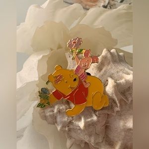 Vintage Winnie The Pooh gold tone pin.